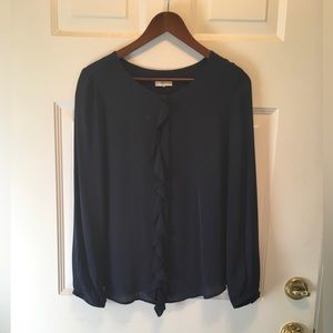 Navy, silk, long-sleeved blouse.